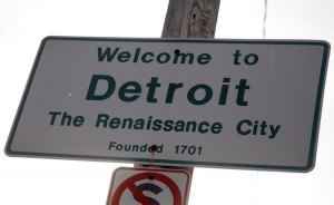 A 'Welcome to Detroit' sign is seen along 8 Mile Road in Detroit